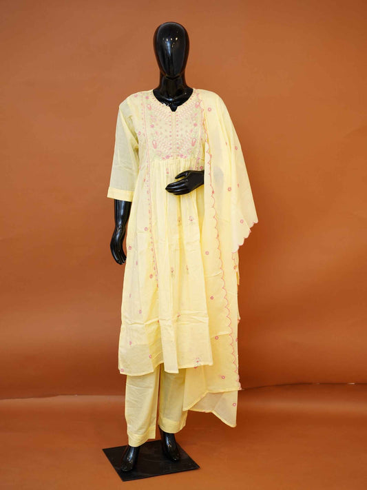 Women's embroidered light yellow mulmul cotton suit set with matching pants and scalloped dupatta available in sizes M to XXL