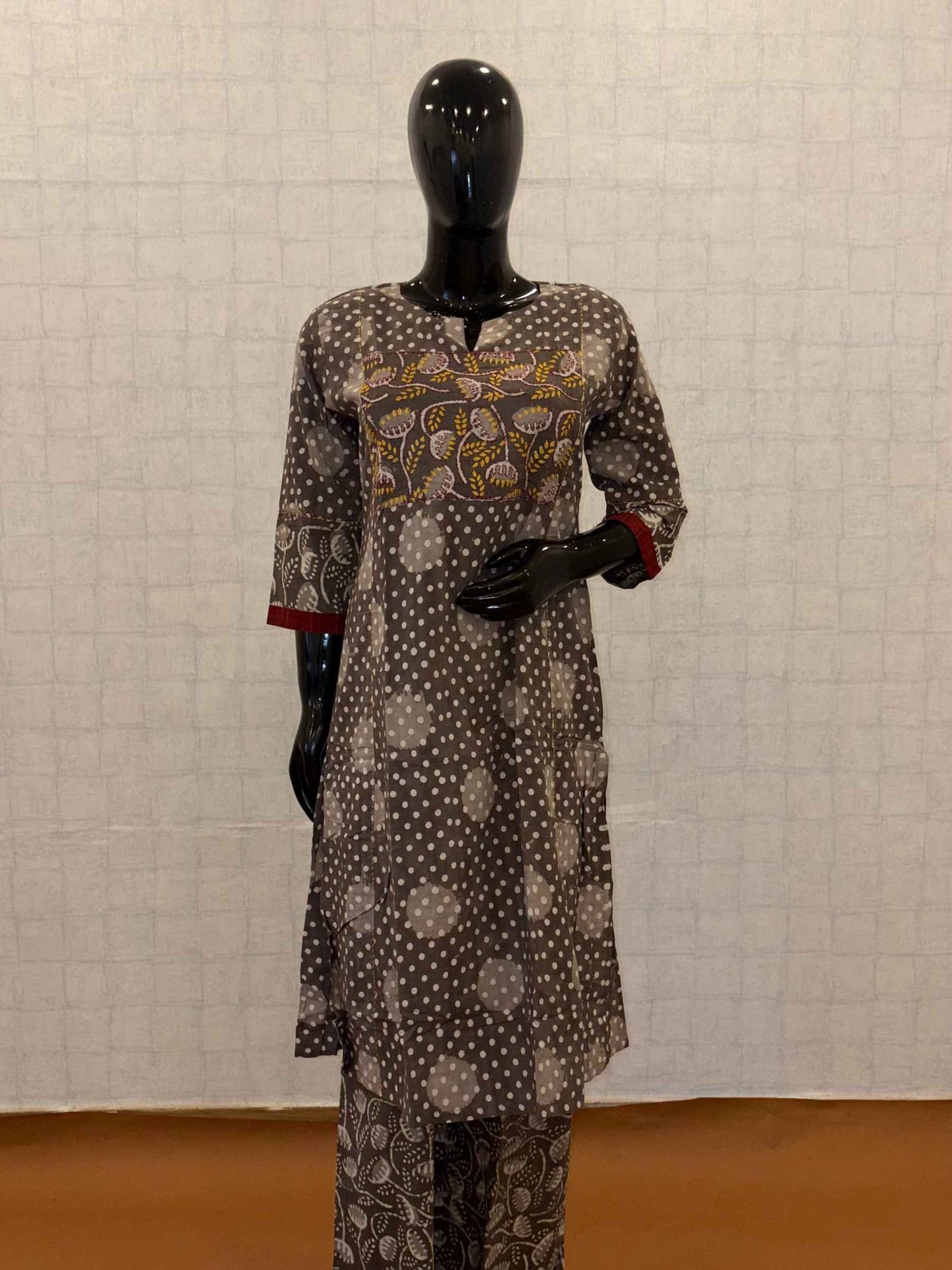 Charcoal grey soft cotton 2-piece kurti pant set with Bandhani dots and mustard floral yoke