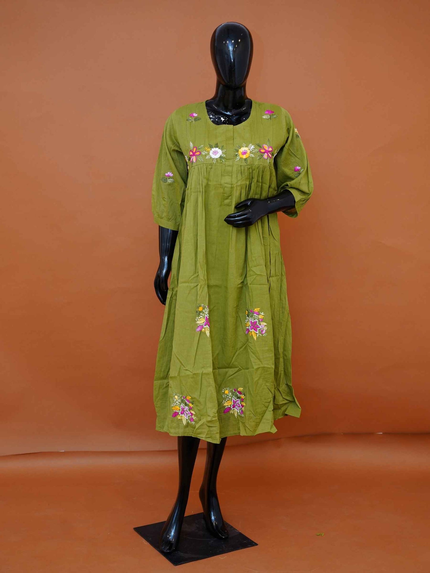 Women's embroidered olive green mulmul cotton A-line dress with 3/4 sleeves available in sizes M to 3XL