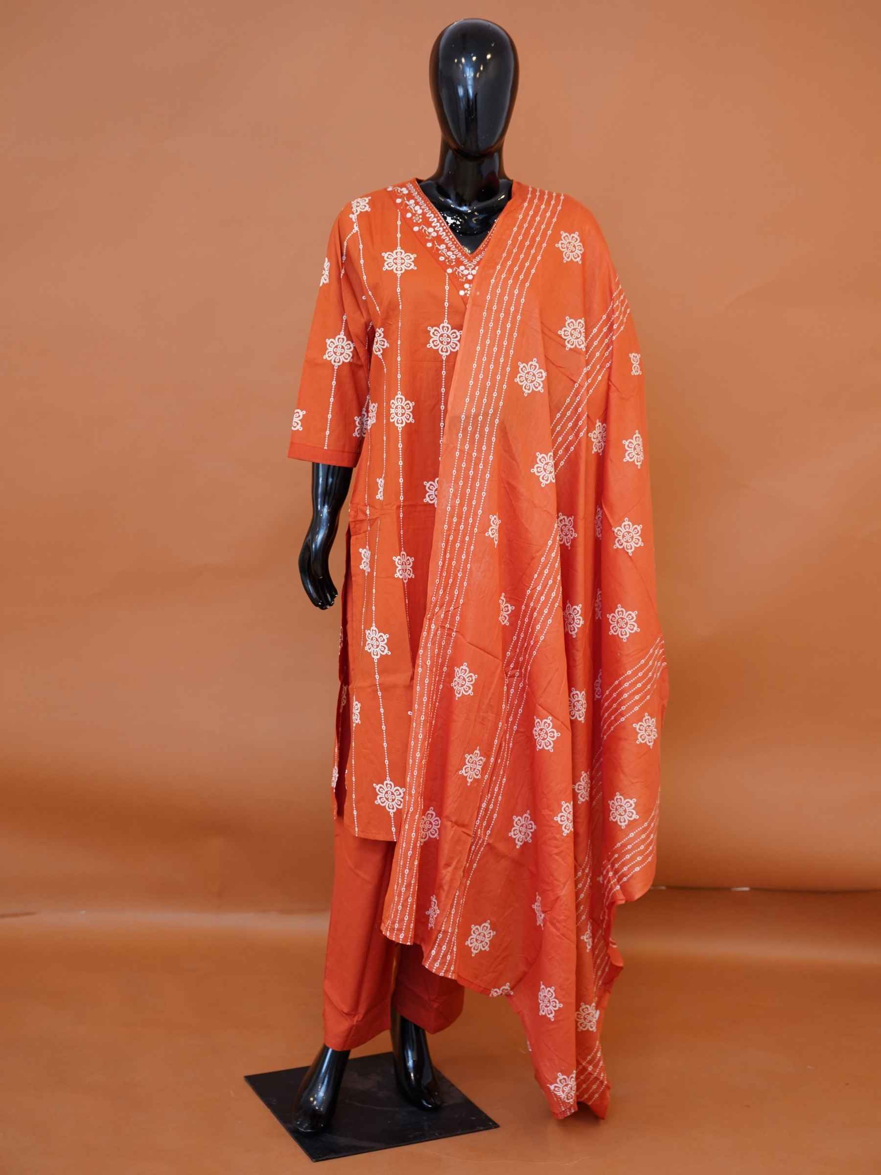 Plus size women's orange Bandhani printed cotton suit set with pants and dupatta available in sizes 4XL, 5XL, 6XL, and 7XL