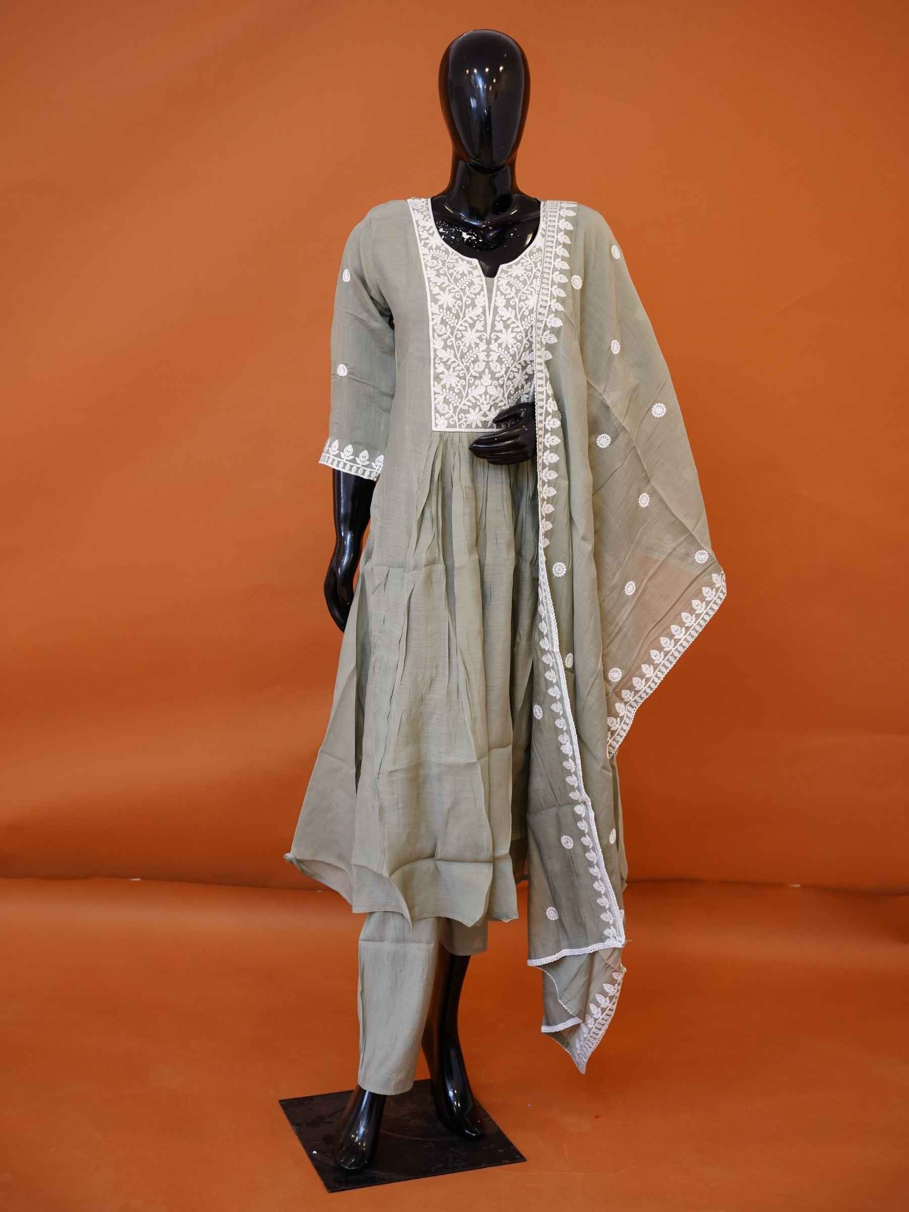 Sage green Muslin silk 3-piece flared kurti set with white Chikankari style embroidery and matching dupatta