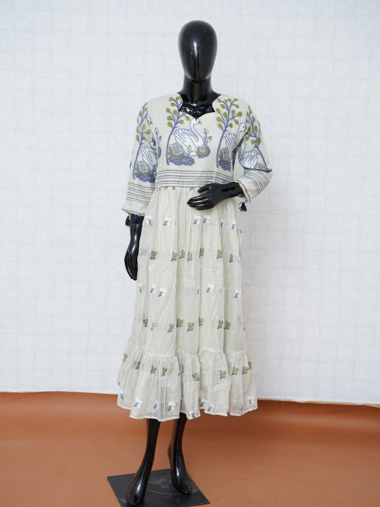 Off-white Muslin Jamdani flared tunic kurti top with handwoven swan motifs