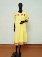 Lemon yellow mul cotton gathered Anarkali kurti with magenta floral applique embroidery
