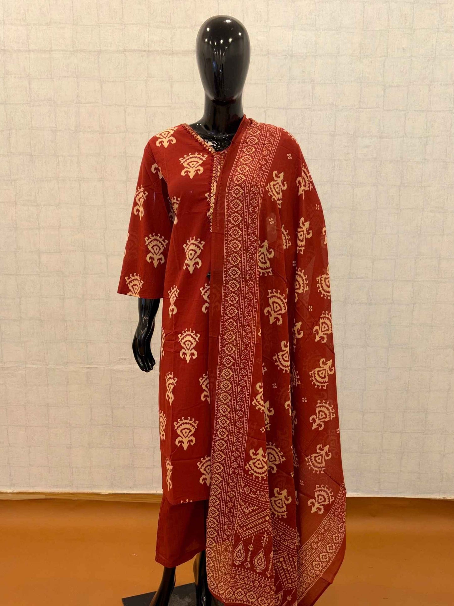Rust red soft cotton 3-piece kurti pant set with cream tribal block prints and matching dupatta