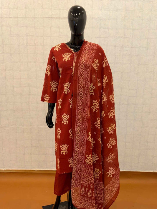 Rust red soft cotton 3-piece kurti pant set with cream tribal block prints and matching dupatta