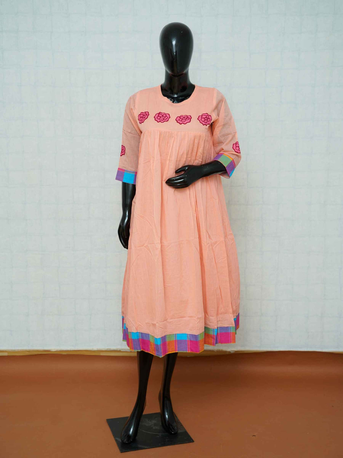 Peach mul cotton gathered Anarkali kurti with magenta floral applique embroidery