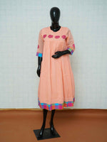 Peach mul cotton gathered Anarkali kurti with magenta floral applique embroidery